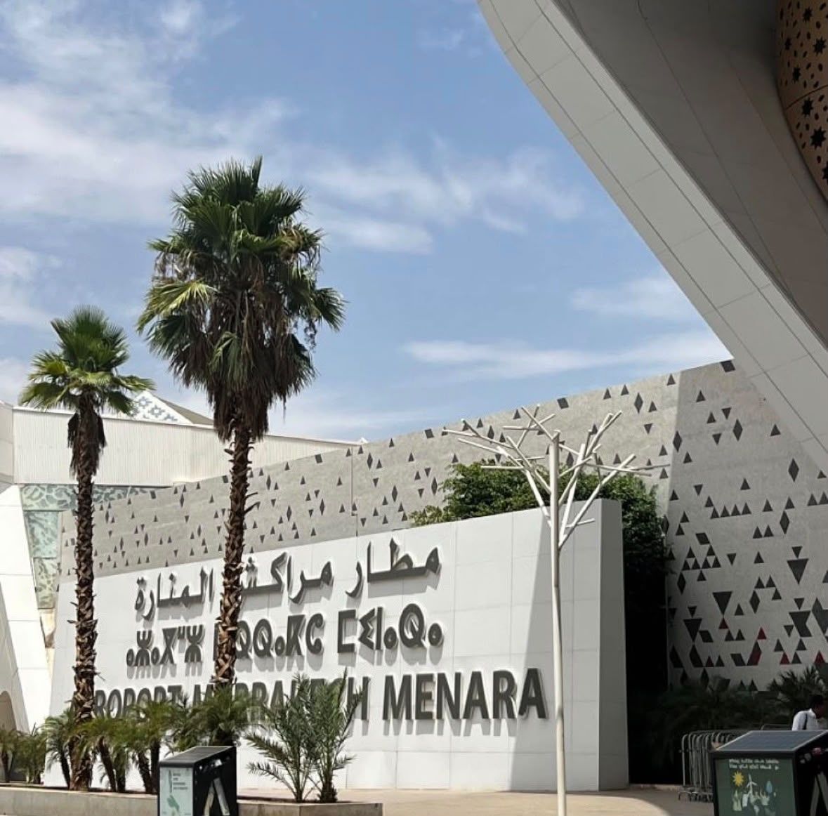 Perforated canopy walkway at Marrakech Menara Airport departures