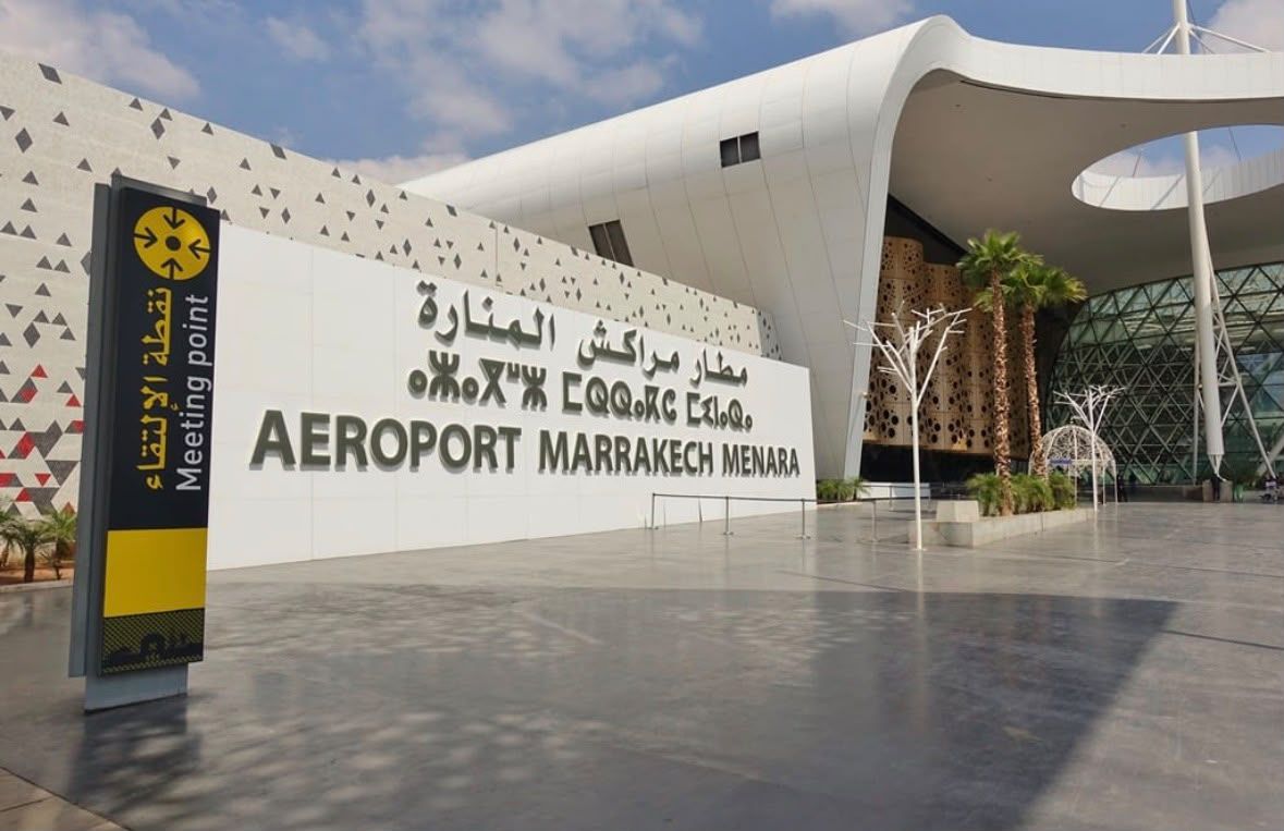 Marrakech Menara Airport meeting point sign at the terminal entrance