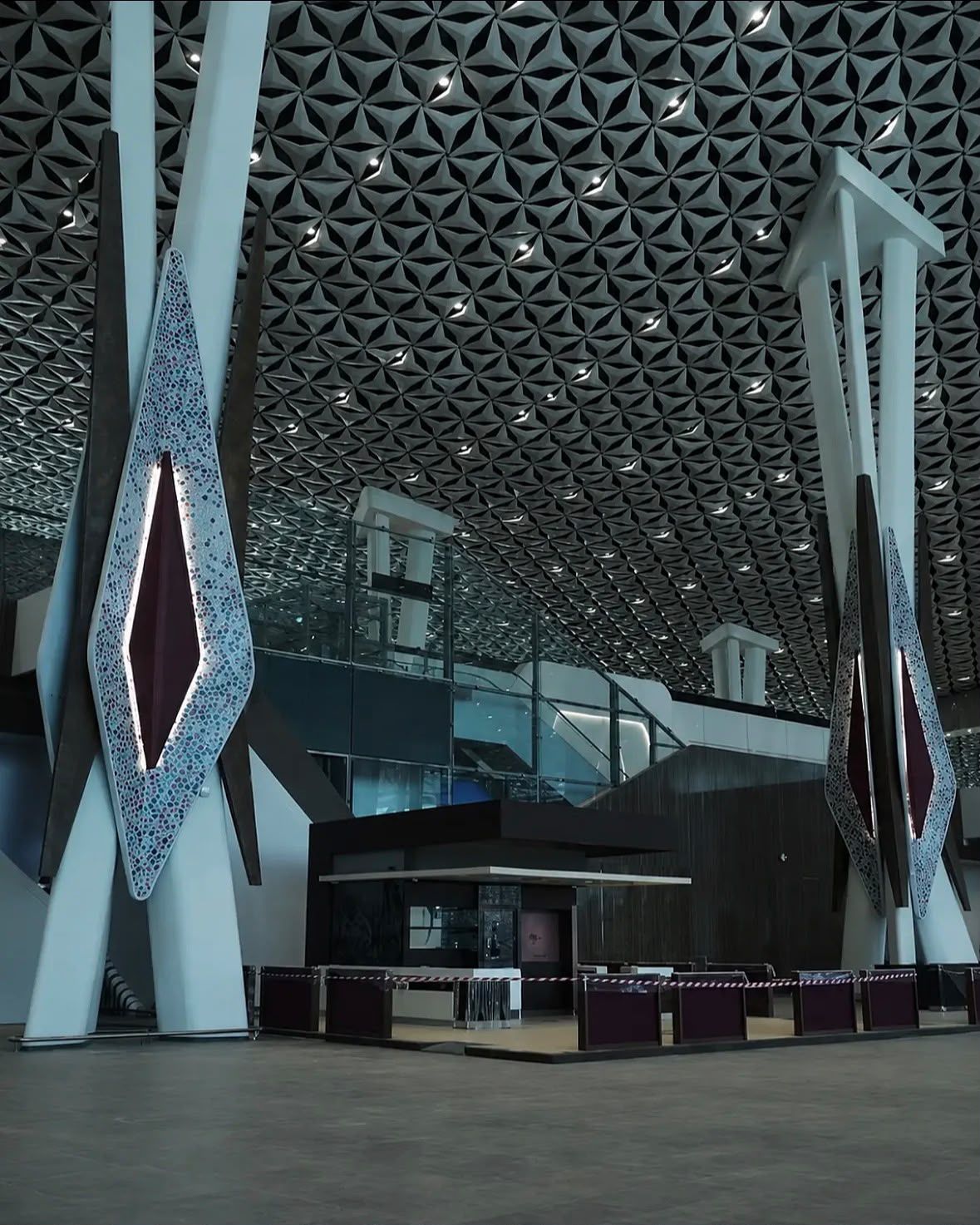 Wide view of the mosaic columns and terminal ceiling at Rabat–Salé Airport